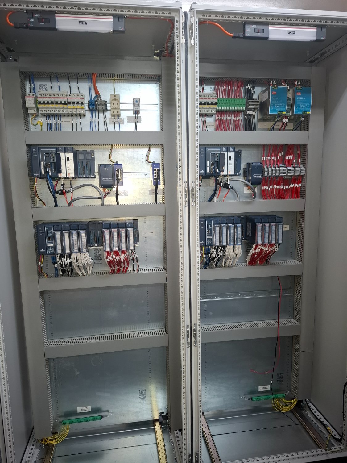 Redundant Emerson PACSystems controller pair and remote I/O in twin control cabinets — KIREAS oil & gas control system